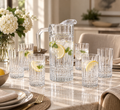 Luminarc jug and six glasses styled with lemon drinks on a dining table